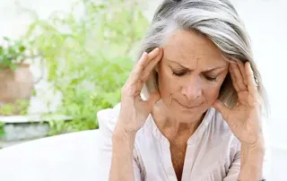 Woman with Migraine Headache