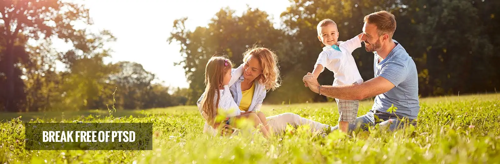 Happy family celebrating parent PTSD treatment